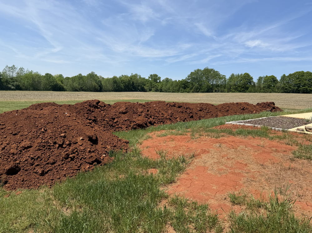 March 2026 land leveling and fire pit project - photo 3