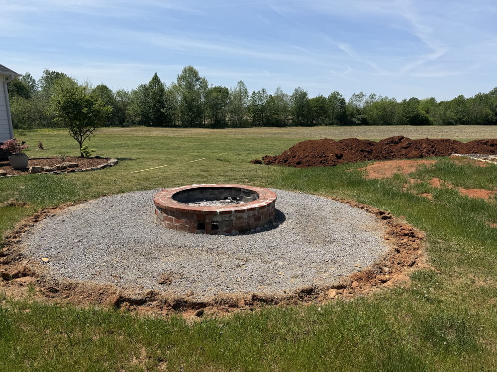 March 2026 land leveling and fire pit project - photo 2